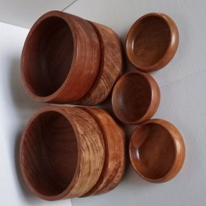 Seven Teak Wood Bowls